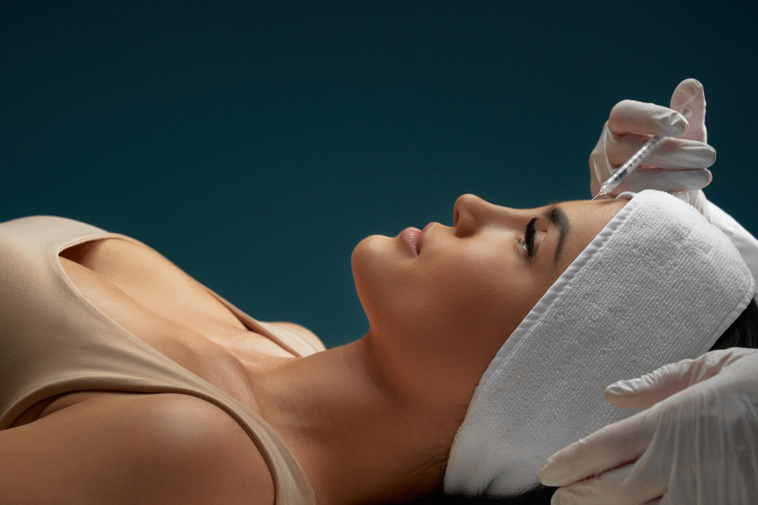 Cosmetic botox injection in forehead